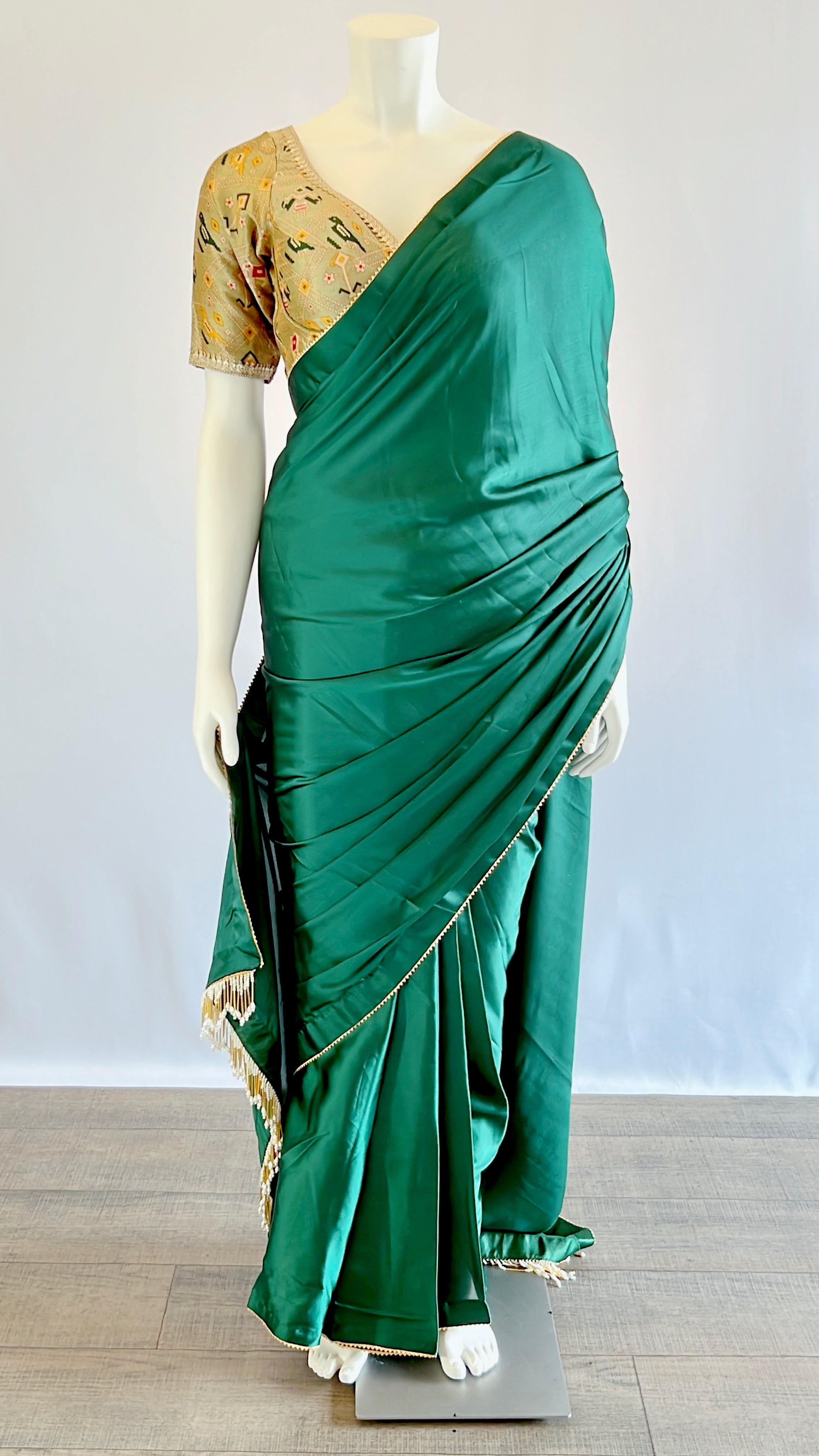 Exquisite Emerald Green Satin Silk Saree with Pre-Pleated Design and Patola Print Blouse - Perfect Blend of Elegance and Tradition for Discerning Women