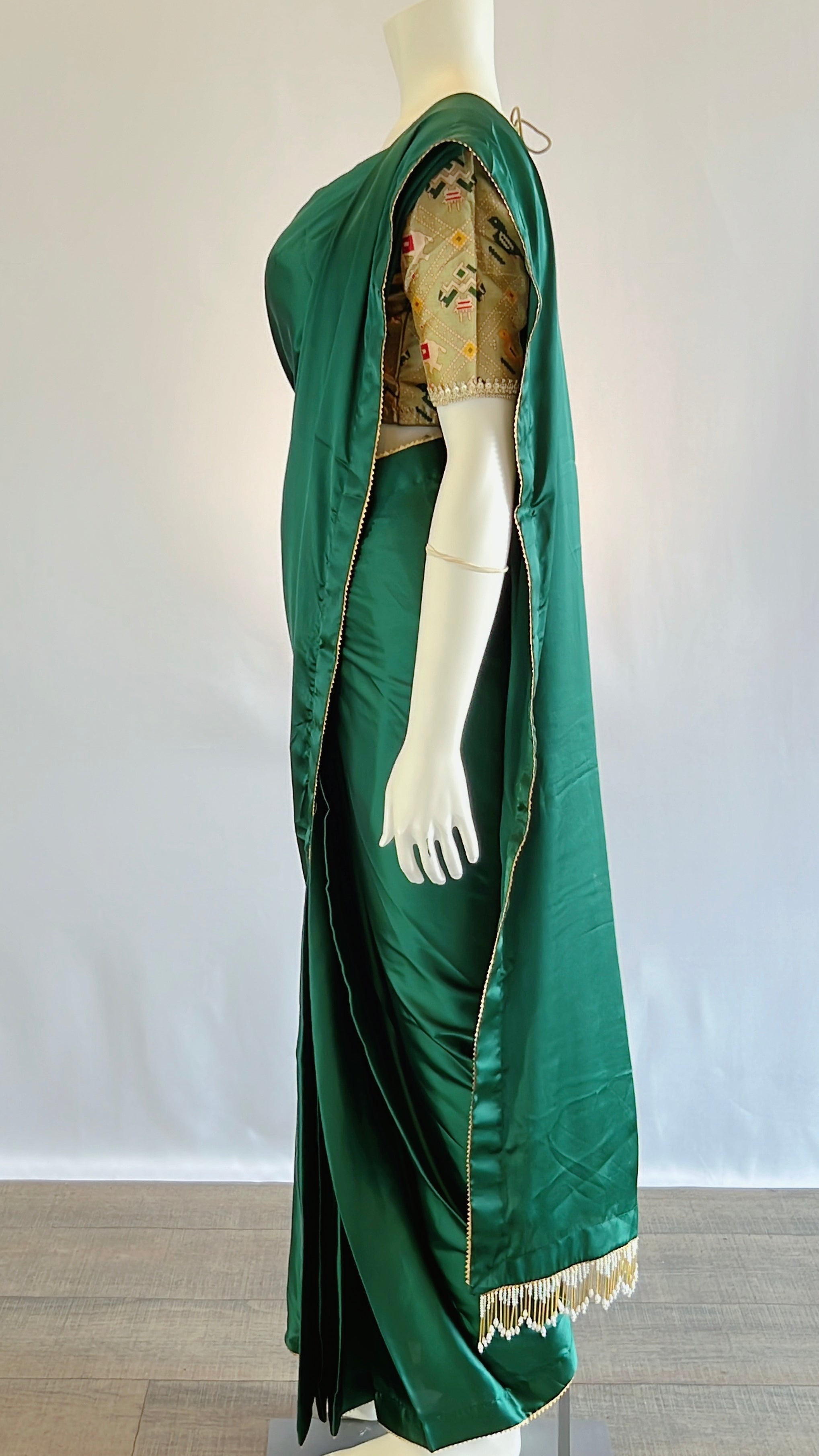 Exquisite Emerald Green Satin Silk Saree with Pre-Pleated Design and Patola Print Blouse - Perfect Blend of Elegance and Tradition for Discerning Women