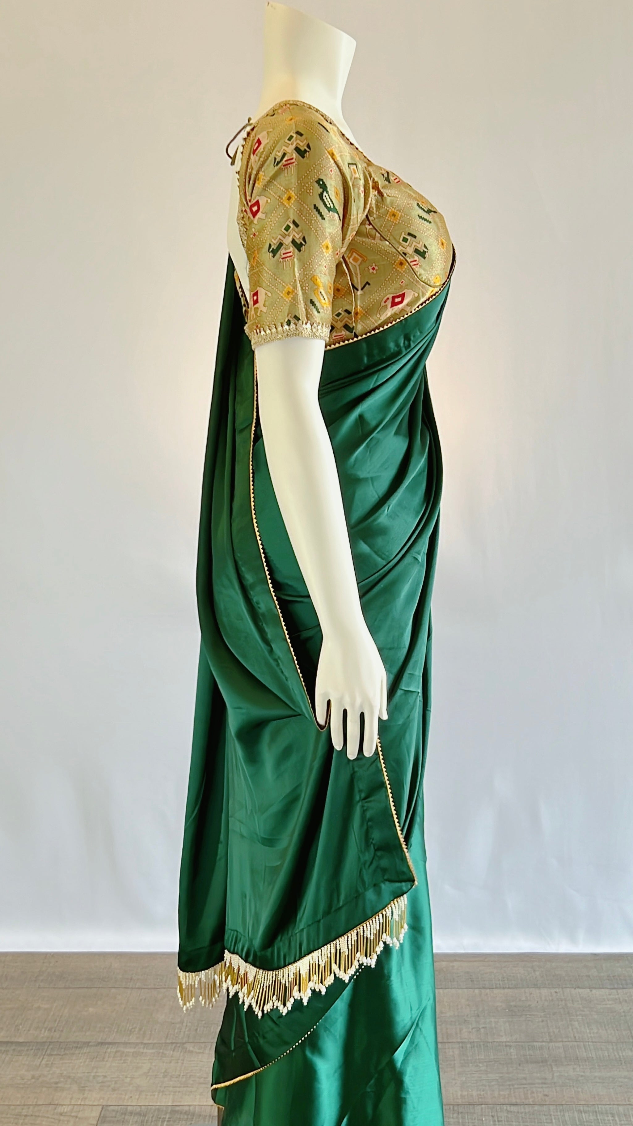 Exquisite Emerald Green Satin Silk Saree with Pre-Pleated Design and Patola Print Blouse - Perfect Blend of Elegance and Tradition for Discerning Women