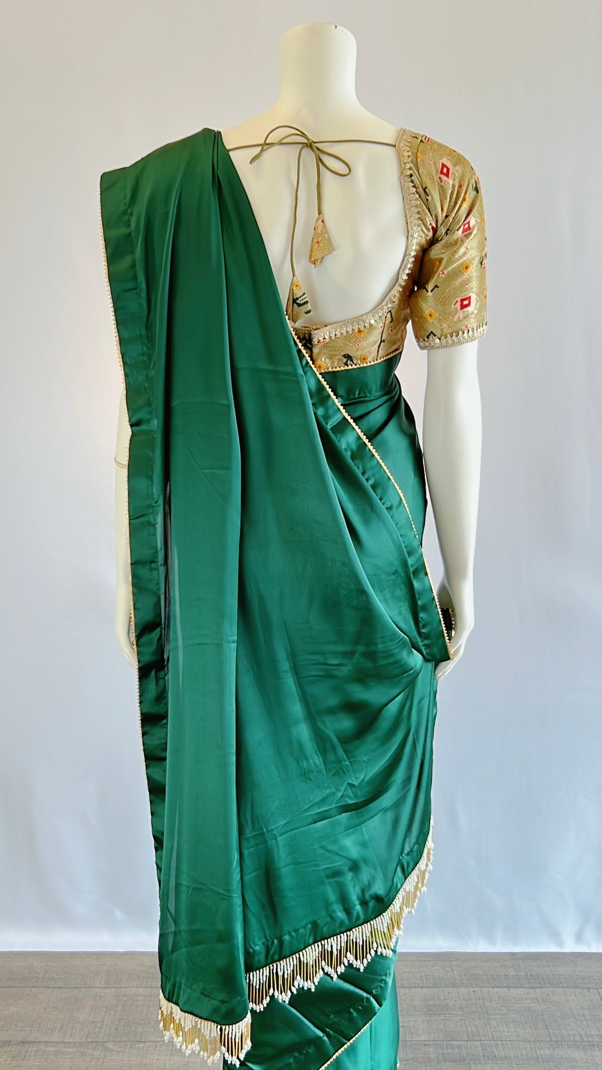 Exquisite Emerald Green Satin Silk Saree with Pre-Pleated Design and Patola Print Blouse - Perfect Blend of Elegance and Tradition for Discerning Women